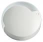 Preview: The image displays a round, flat object in soft, light colors. It has a slightly curved surface and a small indentation on the side. It might be a lid or a cover.