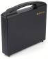 Preview: It is a black, rectangular suitcase with a sturdy handle. The surface is smooth and matte, with a small logo in the top right corner.