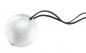 Preview: The image shows a shiny, round ball made of metal or plastic, attached to a black cord. The ball has a smooth surface and a small indentation.