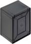 Preview: The image shows a black, rectangular box with rounded corners. The surface is smooth, and on the front, there is a round slot or a hole for a key.