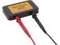 Preview: The image displays a compact, rectangular device with a yellow surface labeled "Veribox VB2". It features red and black inputs for electrical connections.