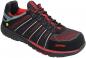 Preview: The shoe is a black, sturdy work shoe with red details. It has a padded tongue, a non-slip sole, and reflective stripes that make it safe.