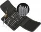 Preview: The image shows a black tool case with several screwdrivers in different sizes. In the center, there is a magnification featuring a row of silver screwdriver bits.