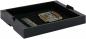 Preview: The image shows a black, flat box with a foam insert. Inside, there is a small circuit board with many contacts and a memory card on the left side.