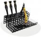 Preview: The image shows a black tool holder with three screwdrivers and a pair of pliers. The compartments are arranged in a grid-like fashion, allowing the tools to be clearly visible.