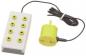 Preview: The image shows a control unit with a rectangular white base and seven yellow buttons. A round yellow part with a power button is attached by a cable.