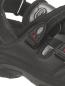 Preview: The image shows a black shoe with a sturdy, sporty design. It features a padded upper, adjustable straps, and a textured rubber sole for good grip.