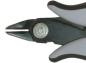 Preview: The image shows the tip of a pair of pliers with two curved handles. The tip of the pliers is pointed and slightly open, with a round screw in the middle. The colors are primarily black and gray.