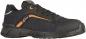 Preview: The shoe is a black sneaker with a textured upper. It features an orange line and a sturdy, non-slip sole. Laces ensure a secure fit.