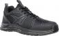 Preview: The shoe is a black sneaker with a textured surface, reinforced toe area, and a flexible rubber sole. It has black laces and a sporty shape.