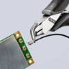 Preview: The image shows a pair of pliers holding a fine wire attached to a green circuit board. The circuit board has golden connectors and a silver surface.