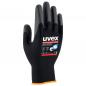 Preview: The image shows a black work glove made of flexible, grippy material. The glove is narrow around the circumference, and the palm has a non-slip texture. There is a yellow border around the wrist.