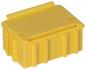 Preview: The image shows a small, yellow plastic box with a flat lid. The box has vertical ridges on the sides and appears sturdy and stable.