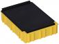 Preview: The image shows a rectangular, yellow box with textured sides and a black lid. The edges are slightly raised, which gives the box stability.