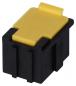 Preview: Das Bild zeigt einen kleinen elektrischen Stecker, der hauptsächlich schwarz ist und eine gelbe Oberseite hat. Die Form ist rechteckig mit einer flachen Abdeckung und einer Aussparung für das Einstecken.