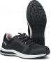 Preview: The image shows a pair of black athletic shoes with breathable uppers. They have a light-colored sole and a treaded sole that provides good grip. Inside, they are lined with a light pink.