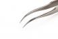 Preview: The image shows a narrow, pointed tweezer made of polished metal. It has two long, curved pincers that meet in the middle and are used for grasping small objects.