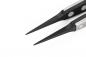 Preview: The image shows a pair of fine, pointed pliers with a black, polished head and metallic handles. The pliers are designed to grip precisely.