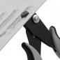 Preview: The image shows part of a drafting board with a holder. The holder has two black, curved handles and a reinforced mechanism that holds the board at a specific angle.