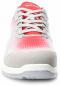 Preview: The image displays an athletic shoe. It is primarily gray with a red-white upper. The laces are gray, and the shoe features a cushioning, white sole.