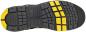 Preview: The image shows the sole of a shoe. It is predominantly black with yellow rubber elements. The tread is grippy and features various patterns for better traction. The "BAAK" logo is embossed.
