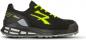 Preview: The shoe is black with bright yellow laces and a yellow logo. It has a sturdy sole with gray and black elements, ideal for sports and exercise.
