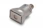 Preview: The image shows a small, rectangular metal object with a smooth surface and a round indentation on one side. It appears to be part of a technical device.