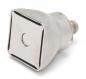 Preview: The image shows a silver, square metal attachment with a slightly curved underside. The top has a square surface with a small, round indentation in the center.