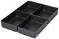 Preview: The image shows four rectangular, flat containers in matte black, closely packed together. They are uniformly shaped and have no handles or lids.