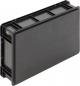 Preview: The image shows a black, rectangular container with a smooth surface and textured sides. It has slightly protruding parts at the corners.