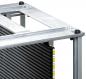 Preview: The image shows a large, rectangular metal frame with a transparent, flat top. Below it are vertical, black slats and numbered scales from 42 to 50.