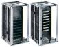 Preview: The image shows two identical, open cases for electronic components. They are made of silver metal and have several vertical slots for components that are well ventilated.