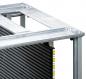 Preview: The image displays a metal frame with a flat surface and a vertical arrangement of black, ridged plates. Numbered markings are visible on the left side.