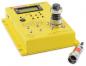 Preview: The image shows a yellow measuring device with a digital display and multiple buttons. There is a rotatable knob on top. A connector is visible on the bottom right.