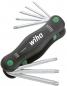 Preview: The image shows a compact black hex key with green grip sides. It is foldable and includes several hex keys in different sizes.