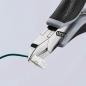 Preview: The image shows a pair of pliers gripping a green wire with a white plug. The pliers have black, rubberized handles and a shiny, metallic blade.