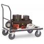 Preview: A flatbed truck with a handle and four wheels. On the surface, there is a black box, tool parts, several round objects, and a control unit. Everything is neatly arranged.