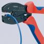 Preview: The image shows a cable crimping tool with red-blue handles. The tool has a closed, black working opening into which a blue cable bundle is inserted.