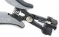 Preview: The image shows a gray pliers with a spring-loaded opening and a sturdy holder, used for precise work. One part is adjustable and includes screw locks.