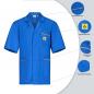 Preview: The image shows a short, light blue work shirt with a yellow logo. It has a zipper and pockets. Information about the materials and features is arranged around the shirt.