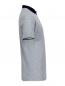 Preview: The image displays a grey polo shirt in profile. It features short sleeves and a dark blue collar. The fabric appears smooth and lightweight. The shirt has a straight cut with no special embellishments.