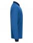 Preview: The image displays a long-sleeved, light blue top with a dark collar. It is made from textured fabric and features a simple, elegant cut.