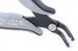 Preview: The image shows a gray pliers with two curved jaws. It has a round handle and a silver screw closure in the middle. The pliers are compact and handy.