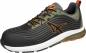 Preview: The shoe is a sporty sneaker with a black and olive green color scheme. It has a modern shape, thick white sole, and orange accents that make it look dynamic.