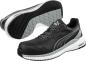 Preview: The picture shows sporty, black-and-white shoes with a gray sole. The shoelaces are gray, and there is a stylish logo stripe on the sides.