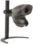 Preview: The image shows a black, technical device with two round openings on the front, mounted on a sturdy base. It has a smooth, ergonomic shape.