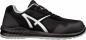 Preview: The shoe is a black athletic shoe with a textured upper. It has a gray sole and a white, curved line on the side, which looks sporty.