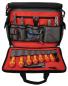 Preview: The image shows a tool bag with a red lining. It contains various tools such as pliers, screwdrivers, and a ruler, neatly arranged in compartments.