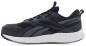 Preview: The image shows a sporty, black shoe with a gray, textured design. The sole is cushioned and slightly raised, ideal for running or leisure activities.