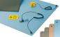 Preview: The image displays a blue ESD protection mat with a yellow warning sign. A cable with a grounding clip and a clamp is connected. Color variants of the mat are also visible.